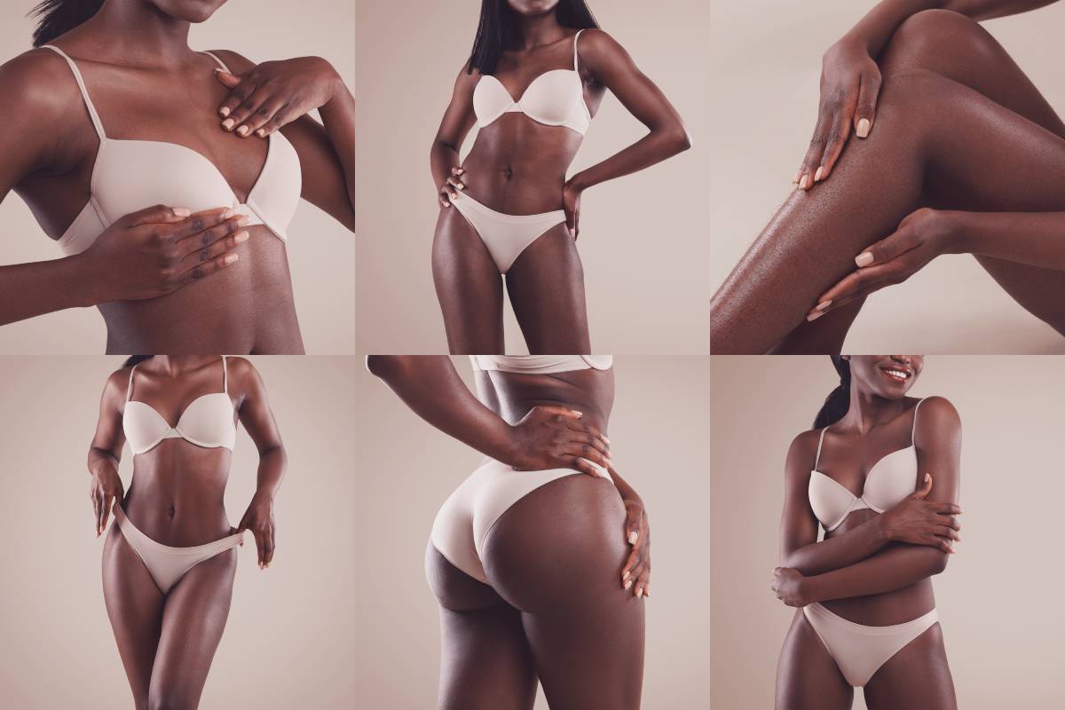 Woman applying lotion and posing.